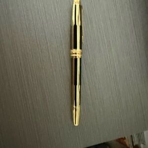 Gold and Black rollerball by Montblanc model 163